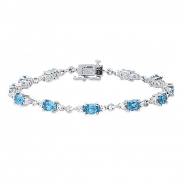 6X4 mm Oval Blue Topaz & 2.3 mm Round White Topaz Ladies Three Stone Bracelet Sterling Silver