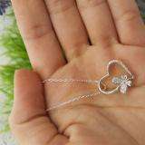 0.15 Carat (ctw) Sterling silver Round Diamond Butterfly Charm Heart Pendant