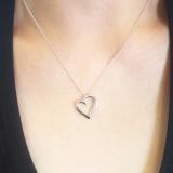 0.15 Carat (ctw) 10K White Gold 3 Stone Lab Grown Diamond Heart Shape Pendant