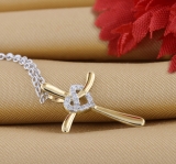 0.05 Carat (ctw) Round Lab Grown Diamond Ladies Heart with Cross Pendant 10K Yellow Gold