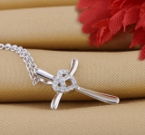 0.05 Carat (ctw) Round Lab Grown Diamond Ladies Heart with Cross Pendant Sterling Silver