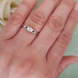 0.20 Carat (ctw) Sterling Silver Round Blue Sapphire And White Diamond Ladies 3 stone Engagement Promise Ring 1/5 CT