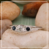 0.20 Carat (ctw) Sterling Silver Round Blue Sapphire And White Diamond Ladies 3 stone Engagement Promise Ring 1/5 CT