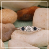 0.20 Carat (ctw) Sterling Silver Round Blue Sapphire And White Diamond Ladies 3 stone Engagement Promise Ring 1/5 CT