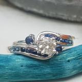 0.90 Carat (ctw) 10k White Gold Round Blue Sapphire And White Diamond Ladies Swirl Bridal Engagement Ring Matching Band Set