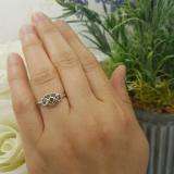0.05 Carat (ctw) Sterling Silver Round Green Emerald Ladies Solitaire Promise Three Heart Infinity Love Engagement Ring
