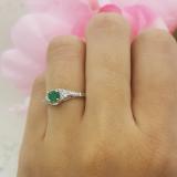 0.38 Carat (ctw) 18k White Gold Round White Diamond And Green Emerald Ladies Swirl Bridal Engagement Ring