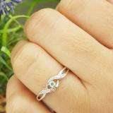 0.06 Carat (ctw) Sterling Silver Round Green Emerald & White Diamond Ladies Crossover Swirl Bridal Promise Engagement Ring