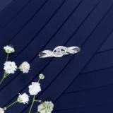 0.06 Carat (ctw) Sterling Silver Round Pink Sapphire & White Diamond Ladies Crossover Swirl Bridal Promise Engagement Ring