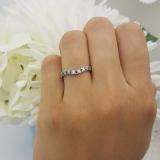 0.15 Carat (ctw) 10K White Gold Round Blue Sapphire & White Diamond Ladies Anniversary Wedding Band Guard Ring
