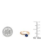 1.33 Carat (ctw) 10K Rose Gold Round & Baguette Blue Sapphire & White Diamond Ladies Bridal Engagement Ring