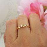 0.10 Carat (ctw) 18K Yellow Gold Round Cut Ruby & White Diamond Ladies Bridal Anniversary Wedding Band Stackable Swirl Ring