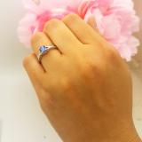 0.75 Carat (ctw) 10K White Gold Round Cut Tanzanite & White Diamond Ladies Solitaire With Accents Bridal Twisted Swirl Engagement Ring 3/4 CT