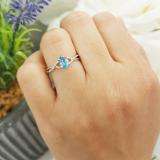 0.50 Carat (ctw) 10K White Gold Oval Cut Blue Topaz & Round Cut White Diamond Ladies Bridal Swirl Split Shank Engagement Promise Ring 1/2 CT