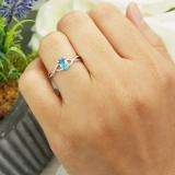 0.50 Carat (ctw) 10K White Gold Oval Cut Blue Topaz & Round Cut White Diamond Ladies Bridal Swirl Split Shank Engagement Promise Ring 1/2 CT