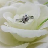 0.15 Carat (ctw) 10K White Gold Round Ruby & White Diamond Ladies Twisted Split Shank Promise Engagement Ring