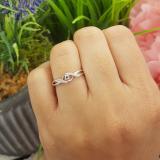 0.05 Carat (ctw) Sterling Silver Round Blue & White Diamond Ladies Crossover Swirl Bridal Promise Engagement Ring
