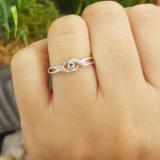 0.05 Carat (ctw) Sterling Silver Round Blue & White Diamond Ladies Crossover Swirl Bridal Promise Engagement Ring