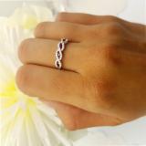 0.35 Carat (ctw) 10K White Gold Round Ruby & White Diamond Ladies Bridal Stackable Anniversary Wedding Band Swirl Ring 1/3 CT
