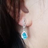 1.30 Carat (ctw) 14K White Gold Pear Cut Blue Topaz & Round Cut White Diamond Ladies Halo Style Dangling Drop Earrings