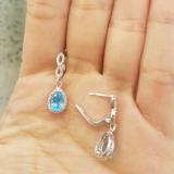 1.30 Carat (ctw) 14K White Gold Pear Cut Blue Topaz & Round Cut White Diamond Ladies Halo Style Dangling Drop Earrings