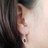 1.30 Carat (ctw) 10K White Gold Pear Cut Garnet & Round Cut White Diamond Ladies Halo Style Dangling Drop Earrings