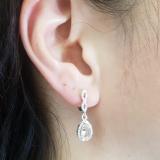 1.30 Carat (ctw) 10K White Gold Pear Cut Morganite & Round Cut White Diamond Ladies Halo Style Dangling Drop Earrings