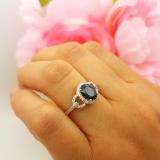 1.45 Carat (ctw) 14K White Gold Oval Cut Blue Sapphire & Round Cut White Diamond Ladies Bridal Halo Style Engagement Ring 1 1/2 CT