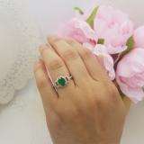1.45 Carat (ctw) 18K White Gold Oval Cut Emerald & Round Cut White Diamond Ladies Bridal Halo Style Engagement Ring 1 1/2 CT