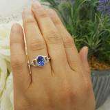 1.45 Carat (ctw) 14K White Gold Oval Cut Tanzanite & Round Cut White Diamond Ladies Bridal Halo Style Engagement Ring 1 1/2 CT