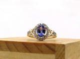 7x5mm Oval Tanzanite & Round White Diamond Split Shank Halo Engagement Ring for Women (0.25 ctw, Color I-J, Clarity I1-I2) 14K Yellow Gold