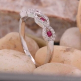 0.28 Carat (ctw) 18K Yellow Gold Round Ruby & White Diamond Ladies Bridal Stackable Anniversary Wedding Band Swirl Ring 1/4 CT