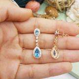 2.65 Carat (ctw) 14K Rose Gold Pear & Oval Cut Blue Topaz & Round Cut White Sapphire & White Diamond Ladies Halo Style Dangling Drop Earrings