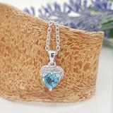 0.60 Carat (ctw) 10K White Gold Heart Cut Blue Topaz & Round Cut White Diamond Ladies Heart Pendant