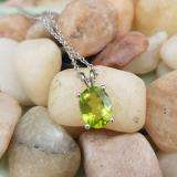1.50 Carat (ctw) Sterling Silver Oval Cut Peridot Ladies Solitaire Pendant (Chain Included) 1 1/2 CT