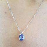 1.50 Carat (ctw) Sterling Silver Oval Cut Tanzanite Ladies Solitaire Pendant (Chain Included) 1 1/2 CT