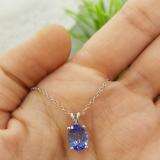 1.50 Carat (ctw) Sterling Silver Oval Cut Tanzanite Ladies Solitaire Pendant (Chain Included) 1 1/2 CT