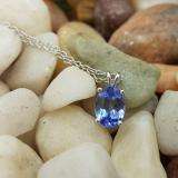 1.50 Carat (ctw) Sterling Silver Oval Cut Tanzanite Ladies Solitaire Pendant (Chain Included) 1 1/2 CT