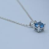 1.00 Carat (ctw) Sterling Silver Round Cut Blue topaz Ladies Solitaire Pendant (Chain Included) 1 CT