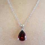 1.50 Carat (ctw) Sterling Silver Pear Cut Garnet Ladies Solitaire Pendant (Chain Included) 1 1/2 CT