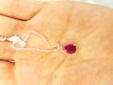 1.50 Carat (ctw) Sterling Silver Pear Cut Ruby Ladies Solitaire Pendant (Chain Included) 1 1/2 CT
