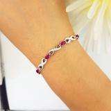 2.27 Carat (ctw) Sterling Silver Real Oval Cut Ruby & Round Cut White Diamond Ladies Infinity Link Tennis Bracelet