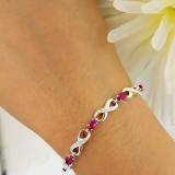 2.27 Carat (ctw) Sterling Silver Real Oval Cut Ruby & Round Cut White Diamond Ladies Infinity Link Tennis Bracelet