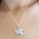 0.10 Carat (ctw) Sterling Silver Brilliant Round White Diamond Ladies Dove Pendant