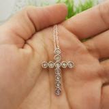 0.04 Carat (ctw) 10k White Gold Round White Diamond Ladies Cross Pendant