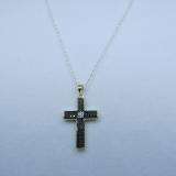 0.15 Carat (ctw) 18k Yellow Gold Plated Sterling Silver Black & White Diamond Ladies Cross Charm Pendant