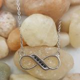 0.05 Carat (ctw) 925 Sterling Silver Round Black Diamond Ladies Infinity Shape 5 Stone Pendant With Free Chain