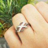 0.25 Carat (ctw) Sterling Silver Round & Baguette Cut Black & White Diamond Ladies Swirl Infinity Wedding Ring 1/4 CT