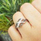 0.25 Carat (ctw) Sterling Silver Round & Baguette Cut Black & White Diamond Ladies Swirl Infinity Wedding Ring 1/4 CT
