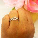 0.05 Carat (ctw) Sterling Silver Round Diamond Ladies Infinity Love Swirl Wedding Anniversary Ring